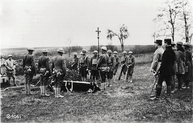 American and French soldiers give a military funeral for those killed on November 3, 1917