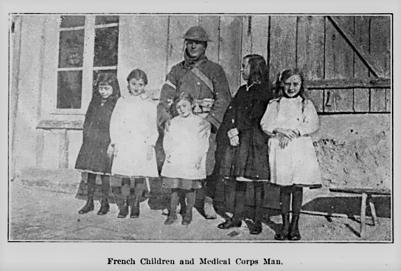 French children and 36th Infantry Division Medical Corps Man.